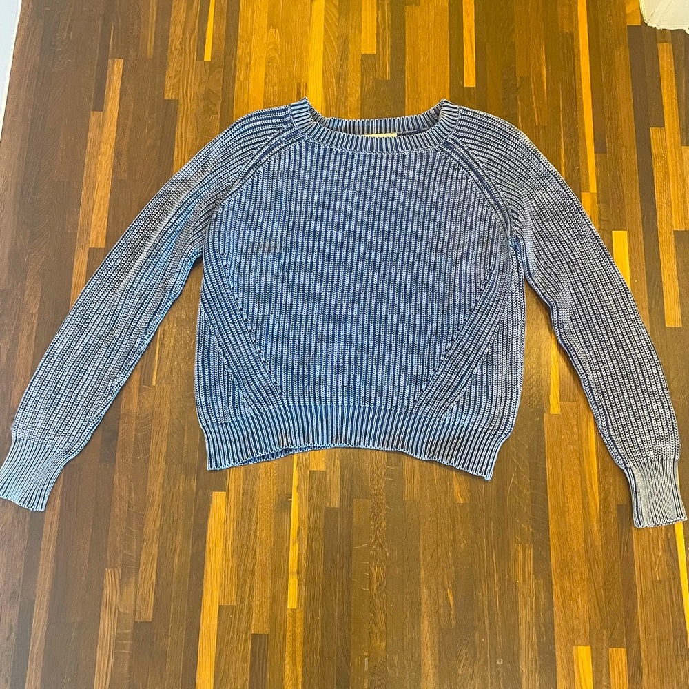 Blue cable-knit sweater